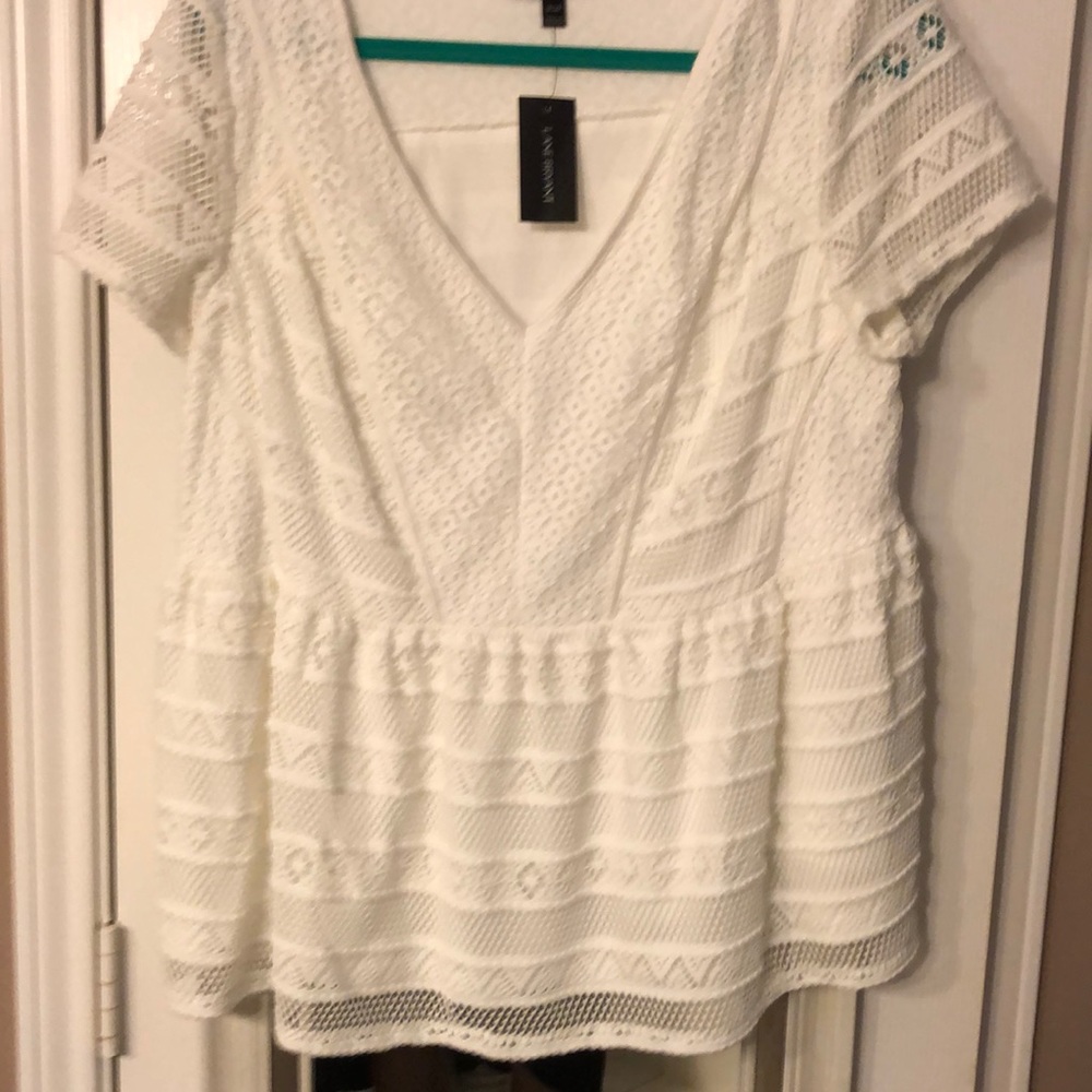 Beautiful white crochet type blouse with attached under cover.